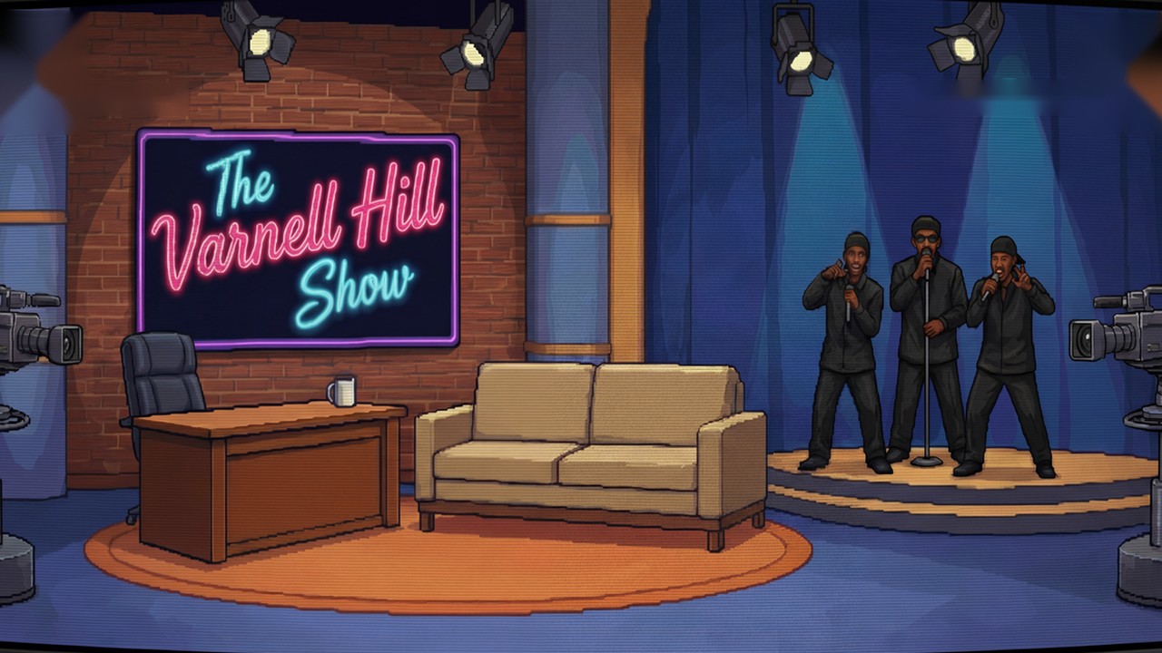 The Varnell Hill Show stage with its talk-show desk, audience, and performers